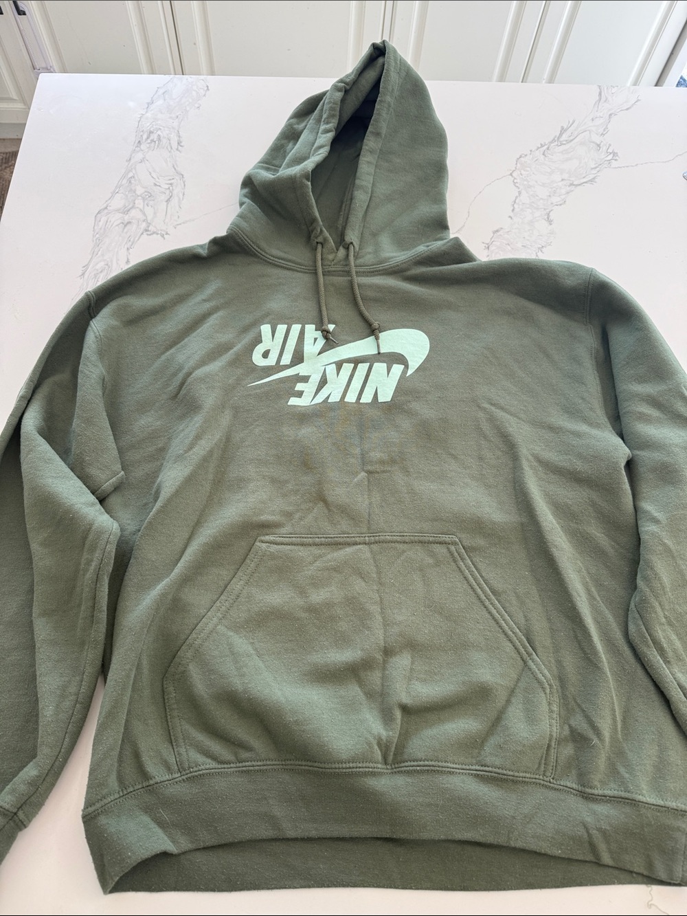 Travis Scott Nike Air Pullover Hoodie in Olive with glow in the dark graphics